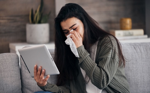 Woman crying on social media