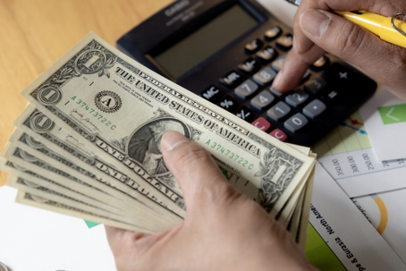 person calculating money