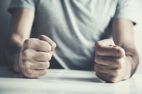 Man's clenched fists